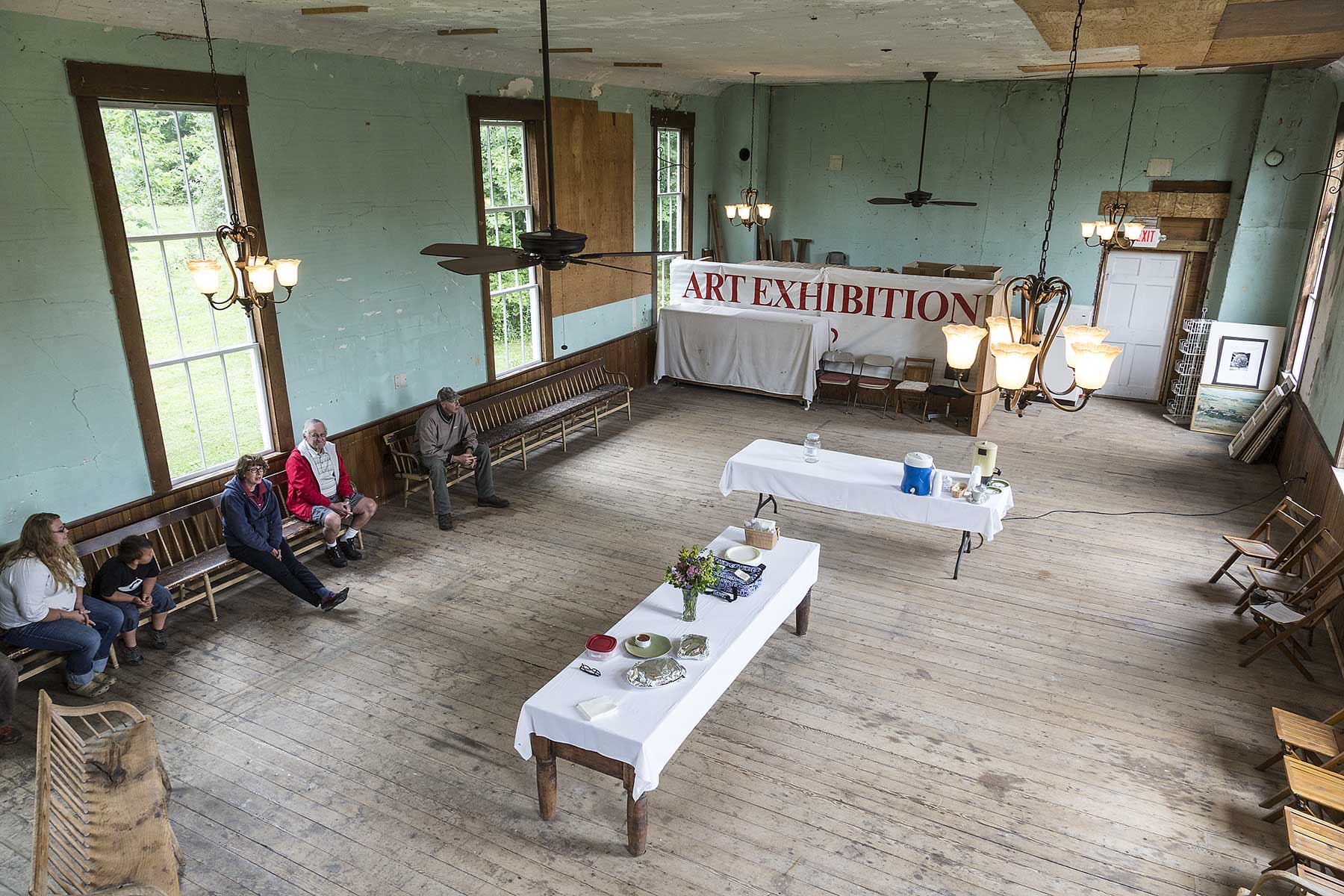 Waiting to welcome guests to a historical society function before restoration.