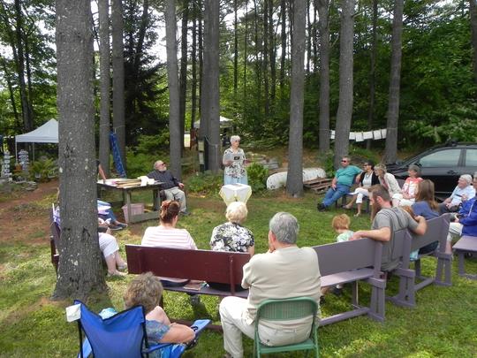 Loisanne Foster reading poetry - Art in the Woods 2016 - Susan and Bob Rock's